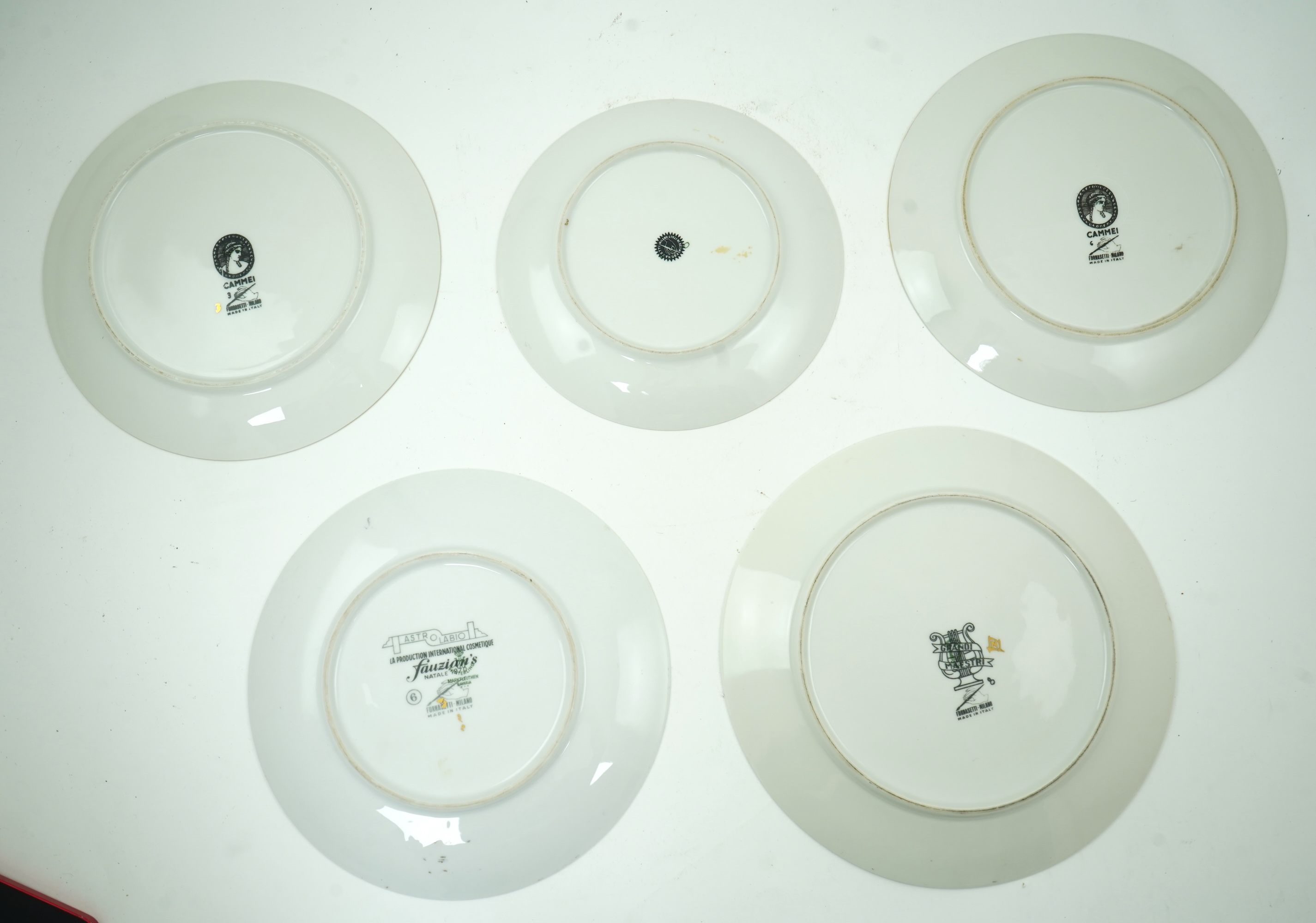 Piero Fornasetti (Italian, 1913-1988): Five various plates